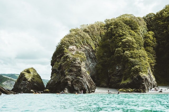 How to Get a Hearty Return on Your Investment (and Enjoy a Slower Pace of Life) annie spratt dV836GXyfJg unsplash - Green and Rock
