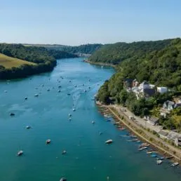 Aerial view of Golant, the river Fowey and the Cormorant property development